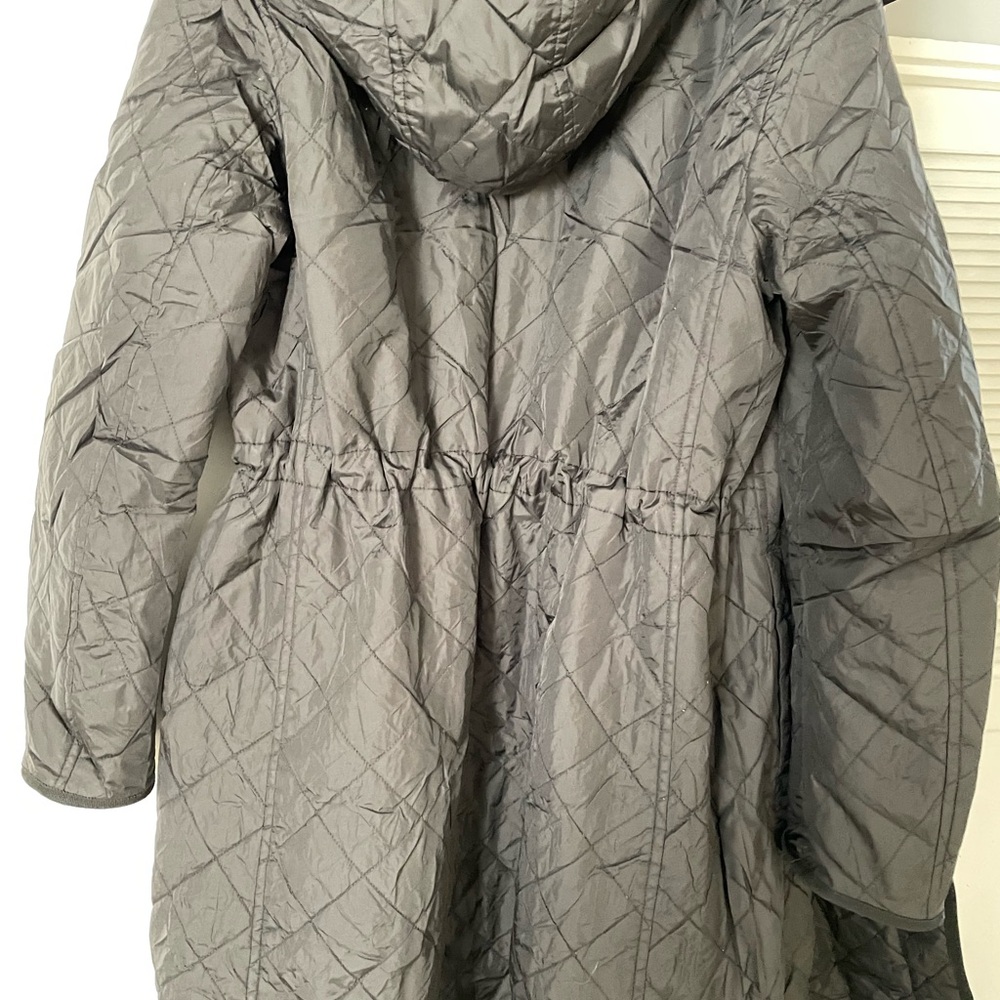 UNIQLO Woman's long coat. Black and very warm.
